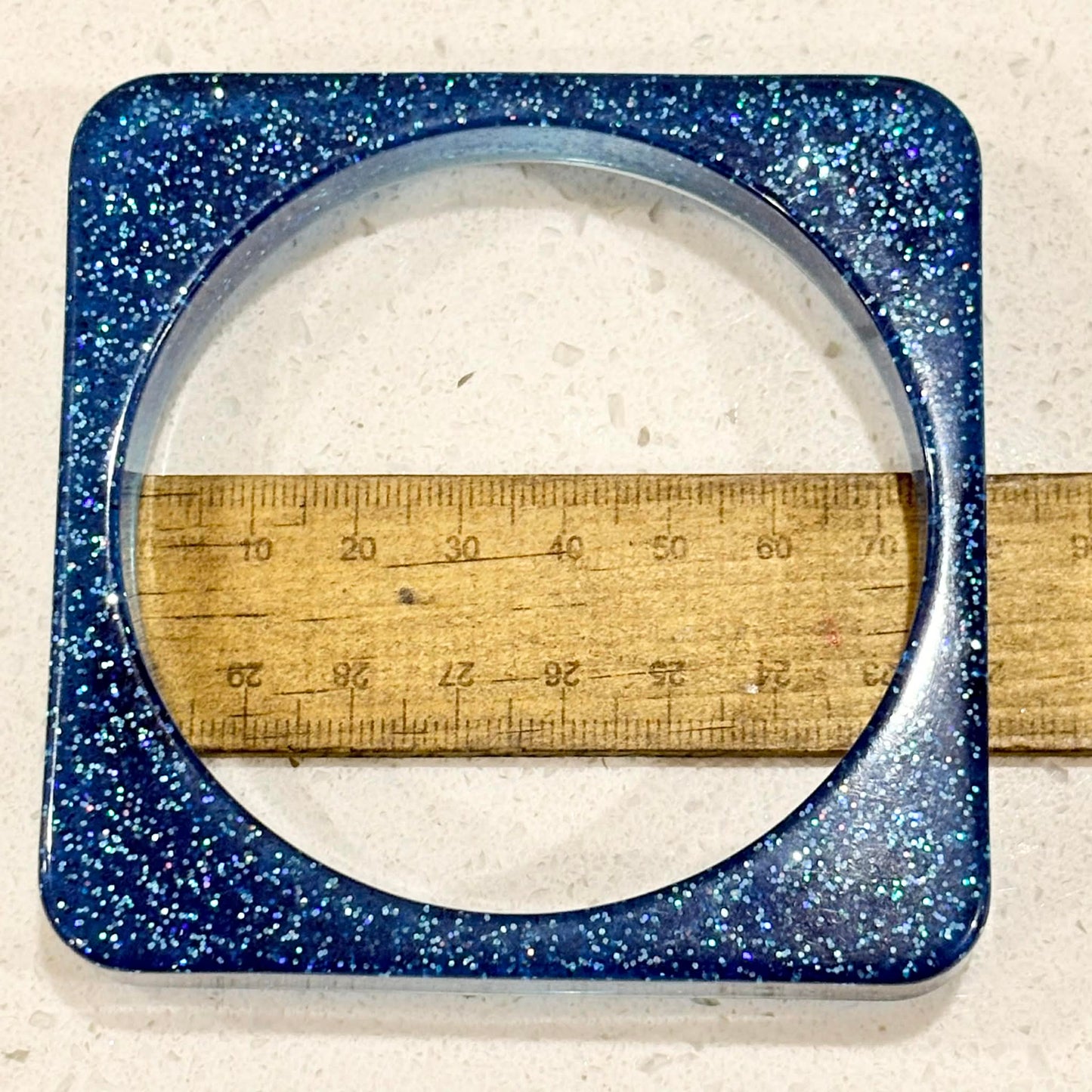 RAY BY DESIGN - Resin Bangle Blue Glitter Square