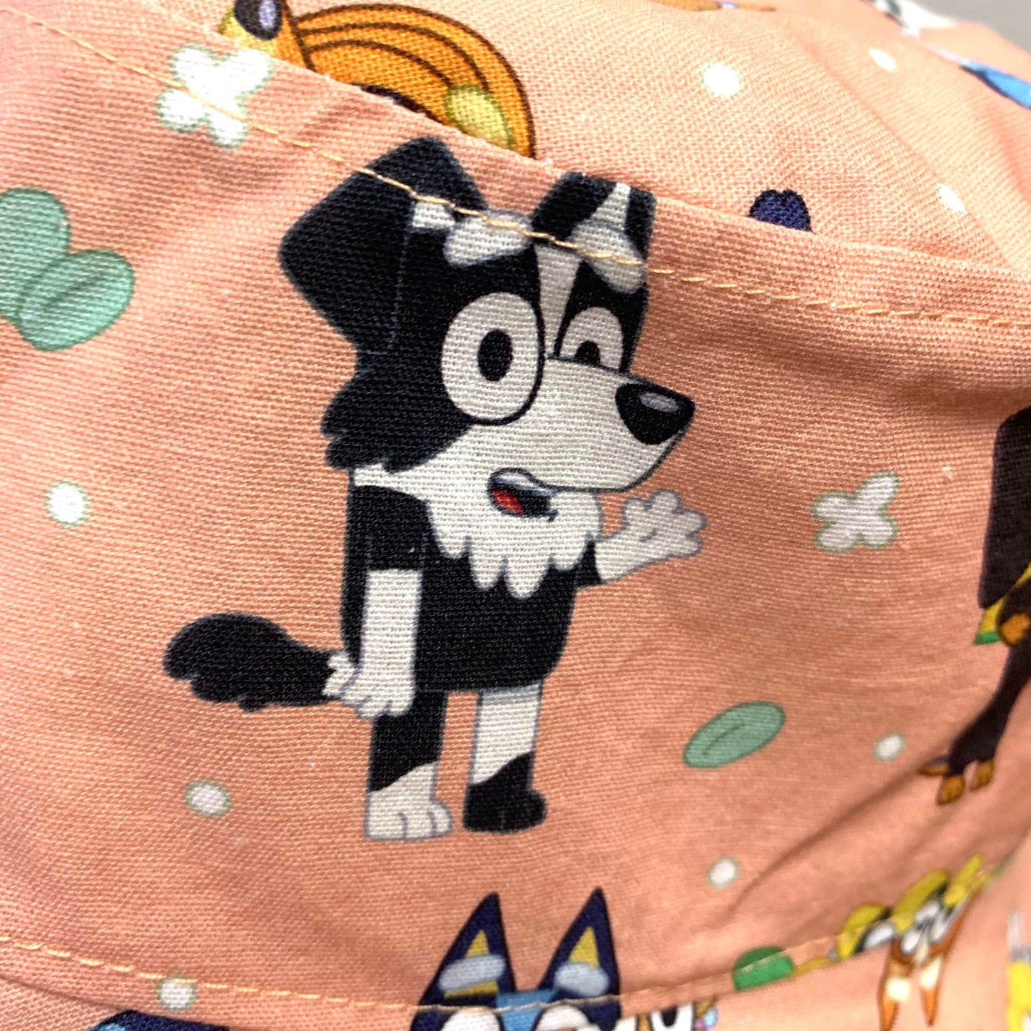 Teacups n Quilts- Bluey Characters Peach Fabric Hat- Kids Size Large
