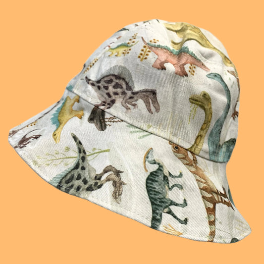 Teacups n Quilts- Cream Dinosaurs Fabric Hat- Kids Size Small